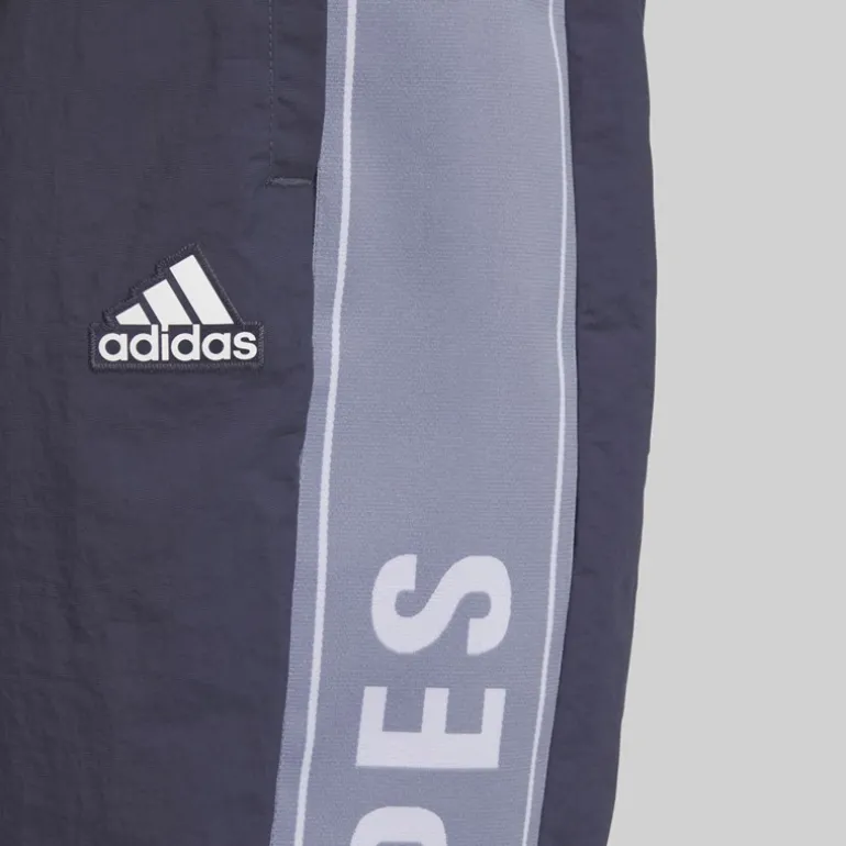 adidas Herren Schriftzug locker geschnittene gewebte Trainingshose Shadow Navy