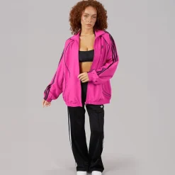 adidas Originals Damen Teamgeist Adicolor Oversized Gewebtes Durchgehendes Reißverschluss Trainings Oberteil Semi Lucid Fuchsia/Schwarz